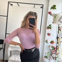 Tops ar caurspīdīgu krūšu daļu